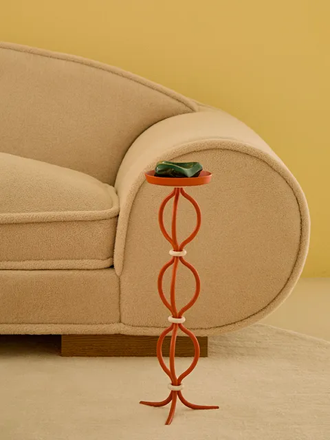 Rouleaux Sofa and Anneaux Standing Ashtray